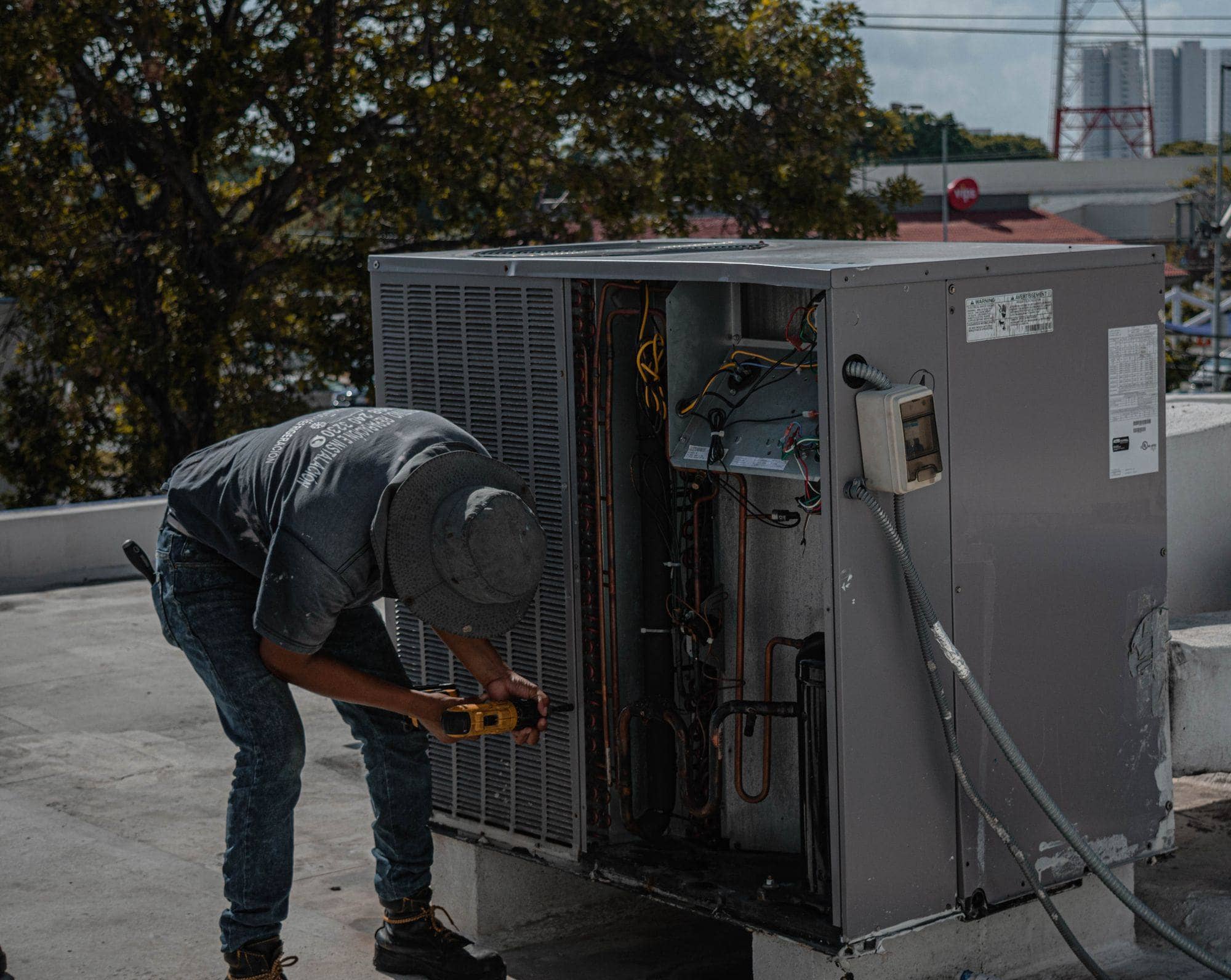 An HVAC technician at work