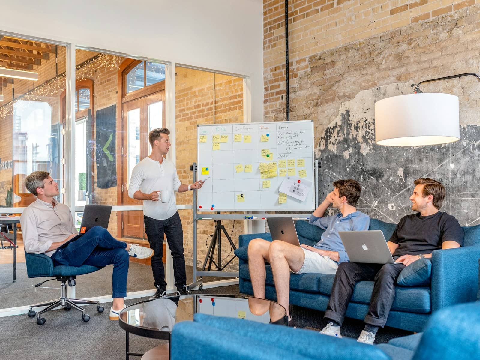 Team collaborating around a table on a project