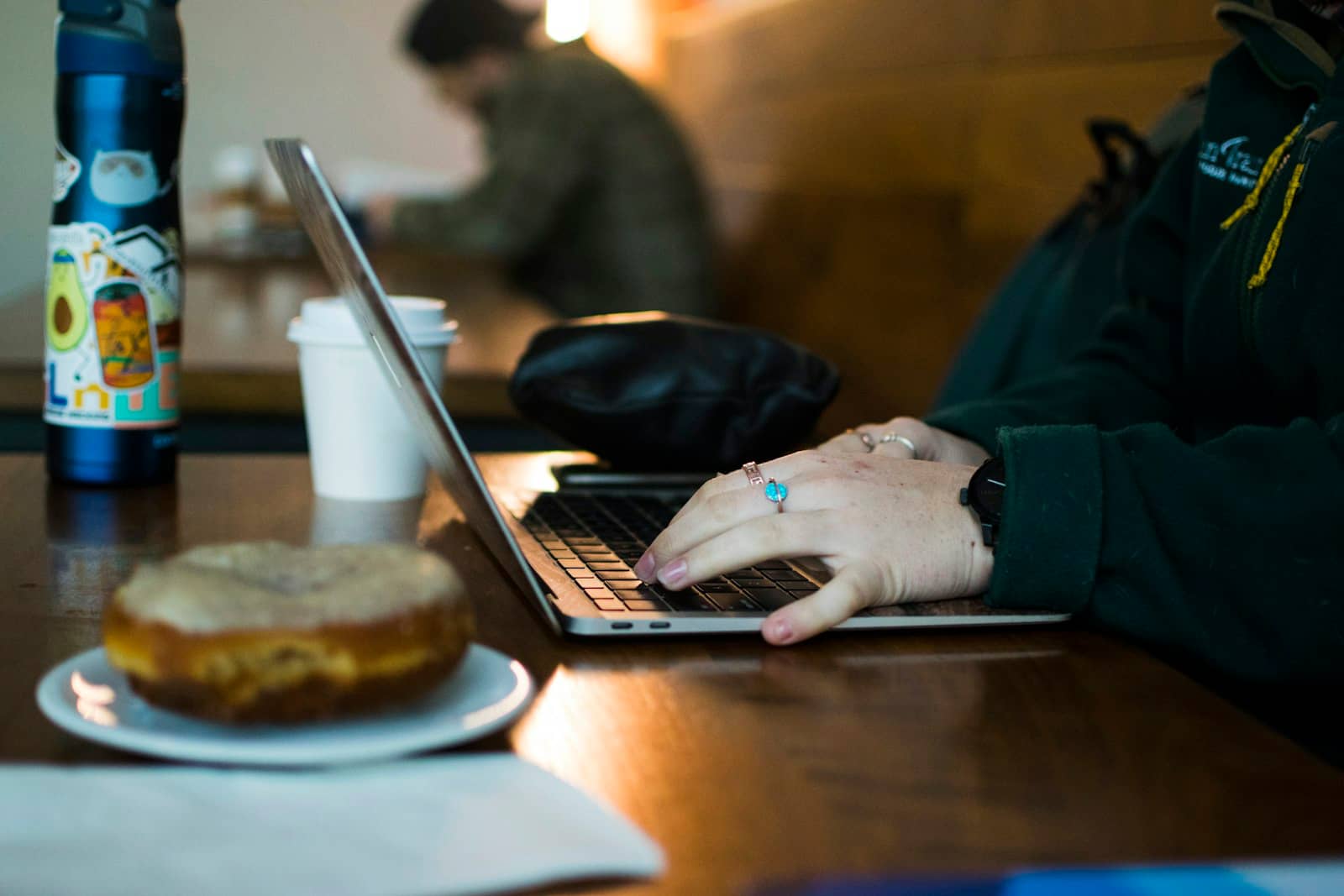 Person at a laptop responding to a customer message